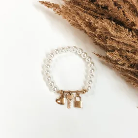 Lock Up Your Heart Bracelet in White/Gold