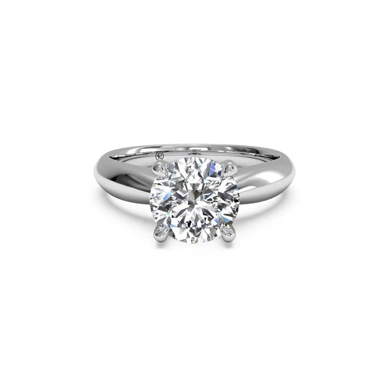 Tapered Surprise Diamond Round Diamond Engagement Ring